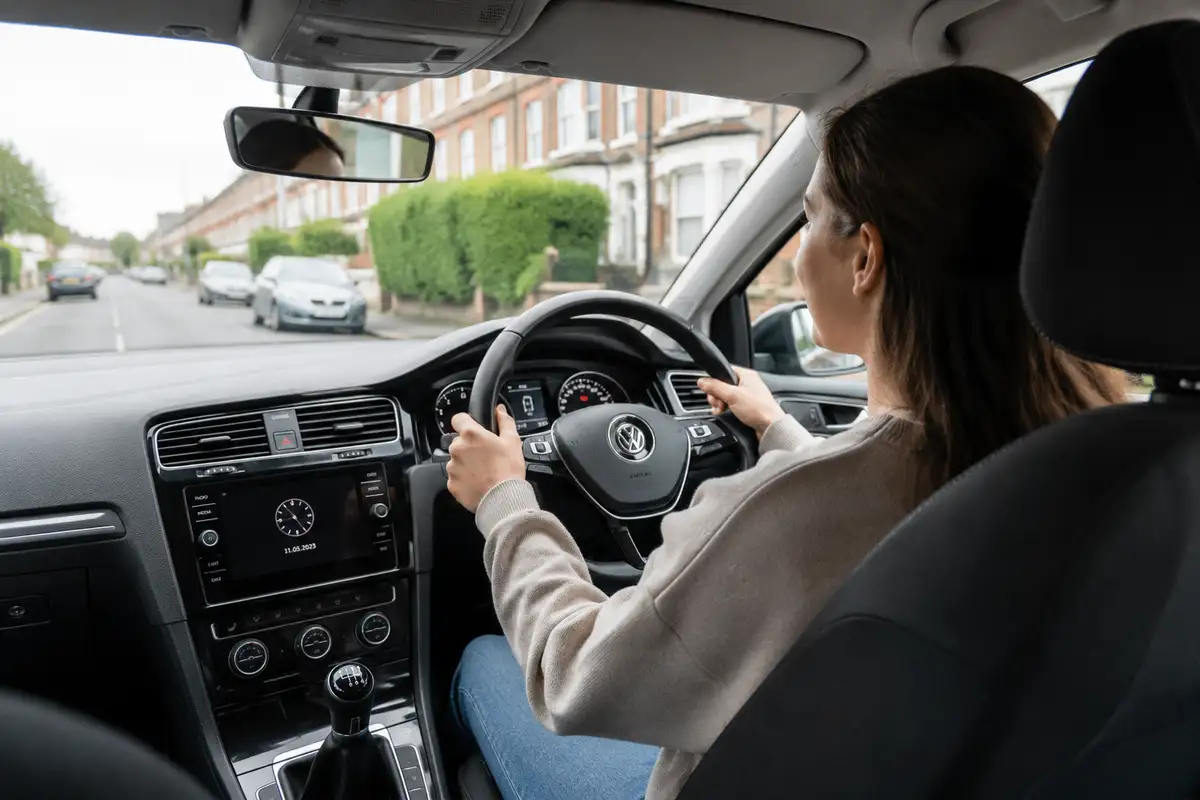 Learner driver practising on a UK residential street
