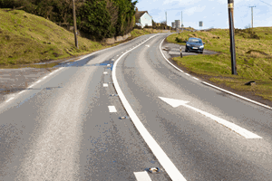 Illustration for the theory test question: What does the above arrow road marking mean?