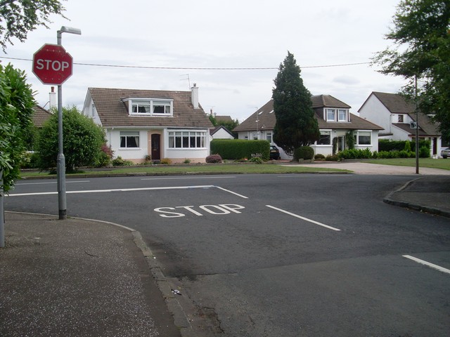 Illustration for the theory test question: What should you do at this junction?