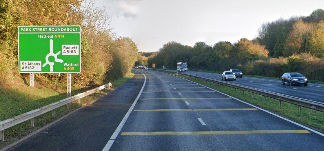 Illustration for the theory test question: Why are these yellow lines painted across the road?